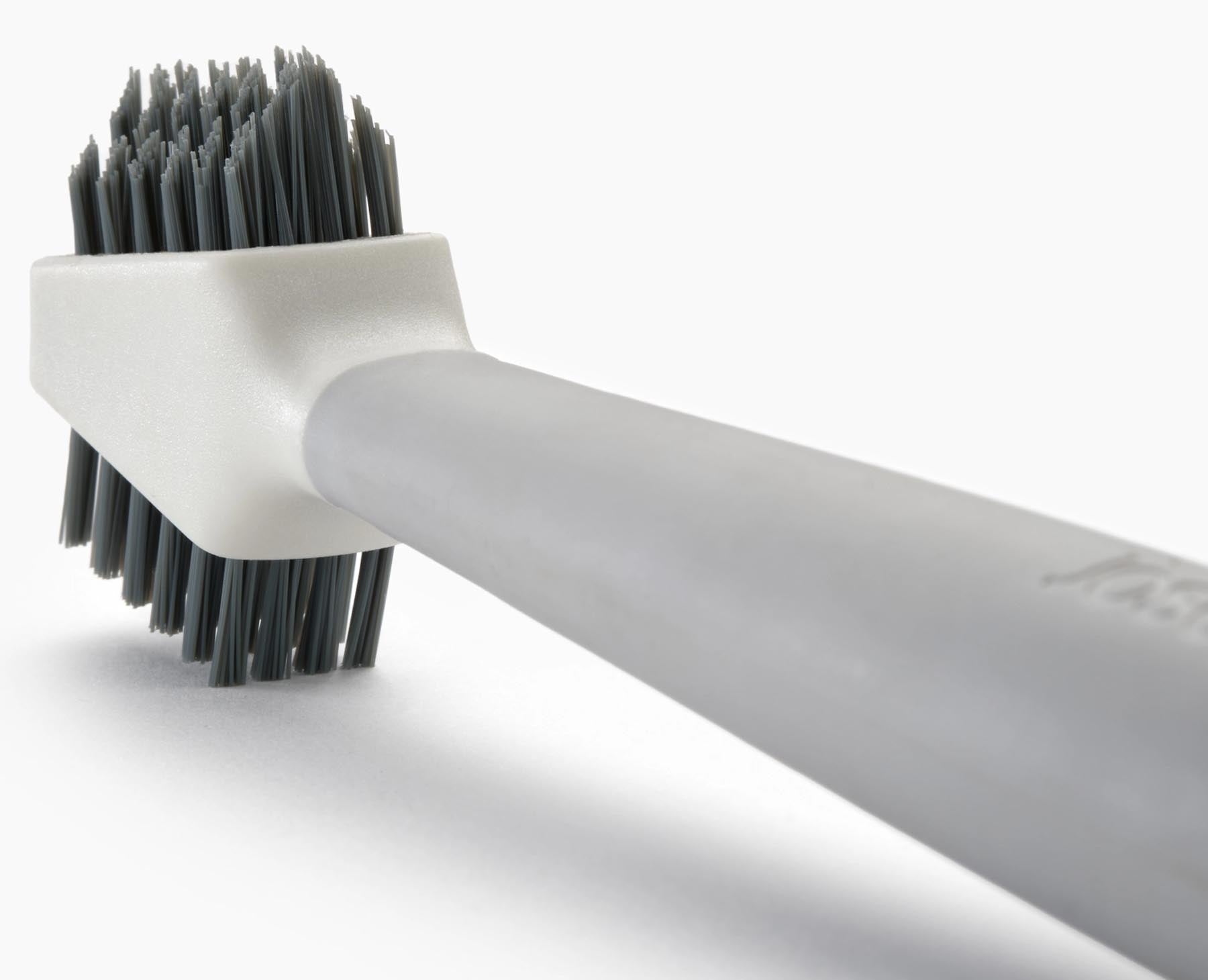 Vielseitige CleanTech 3-in-1 Reinigungsbürste in stilvollem Lichtstein, perfekt für effektive Reinigung von Küchenutensilien und Oberflächen.