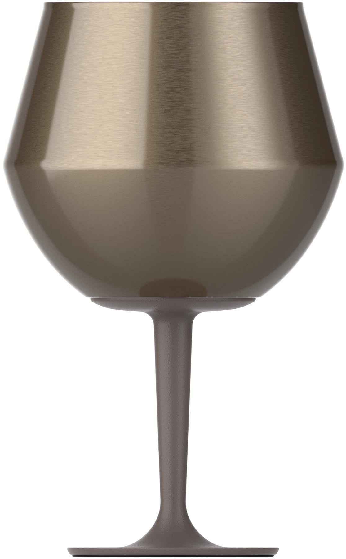 Elegantes, prismatic Cocktailglas in schimmerndem Gold, ideal für stilvolle Drinks und als Aufbewahrungsbehälter von Stanley.
