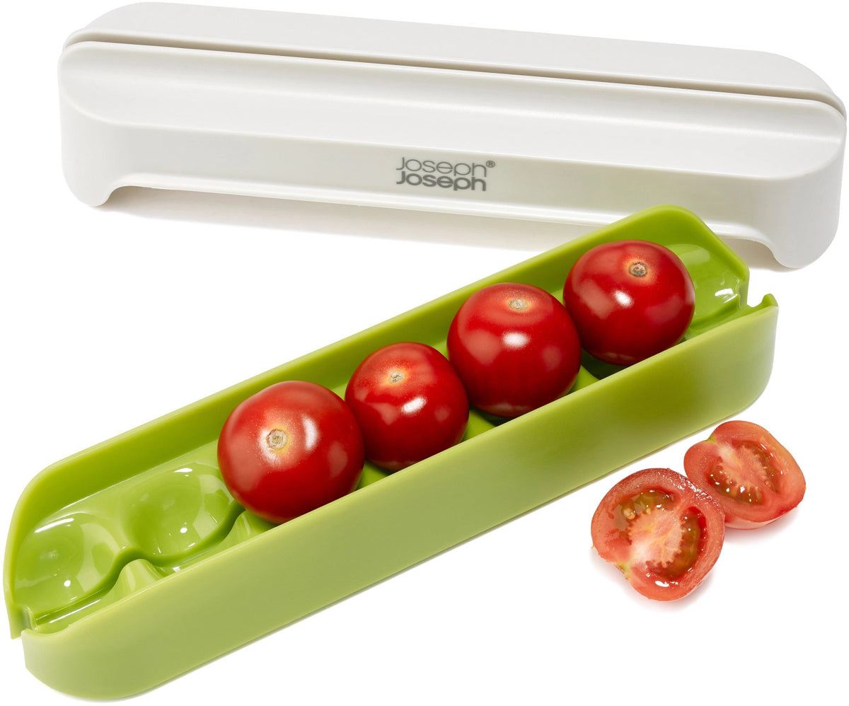 Halve-It Lebensmittel Schneidehilfe in Grün präsentiert im Onlineshop von KAQTU Design AG. Schneider und Stecher ist von Joseph Joseph