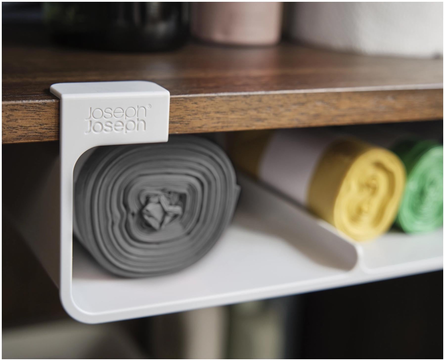 Stylischer Küchenorganizer von Joseph Joseph in Grau, ideal zur Aufbewahrung von Recycle-Beuteln. Praktisch und platzsparend für jede Küche.
