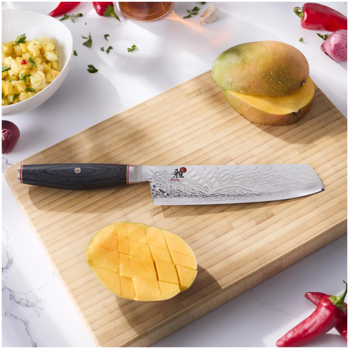 Tenmei Nakiri 17cm in Schwarz präsentiert im Onlineshop von KAQTU Design AG. Küchenmesser ist von Miyabi