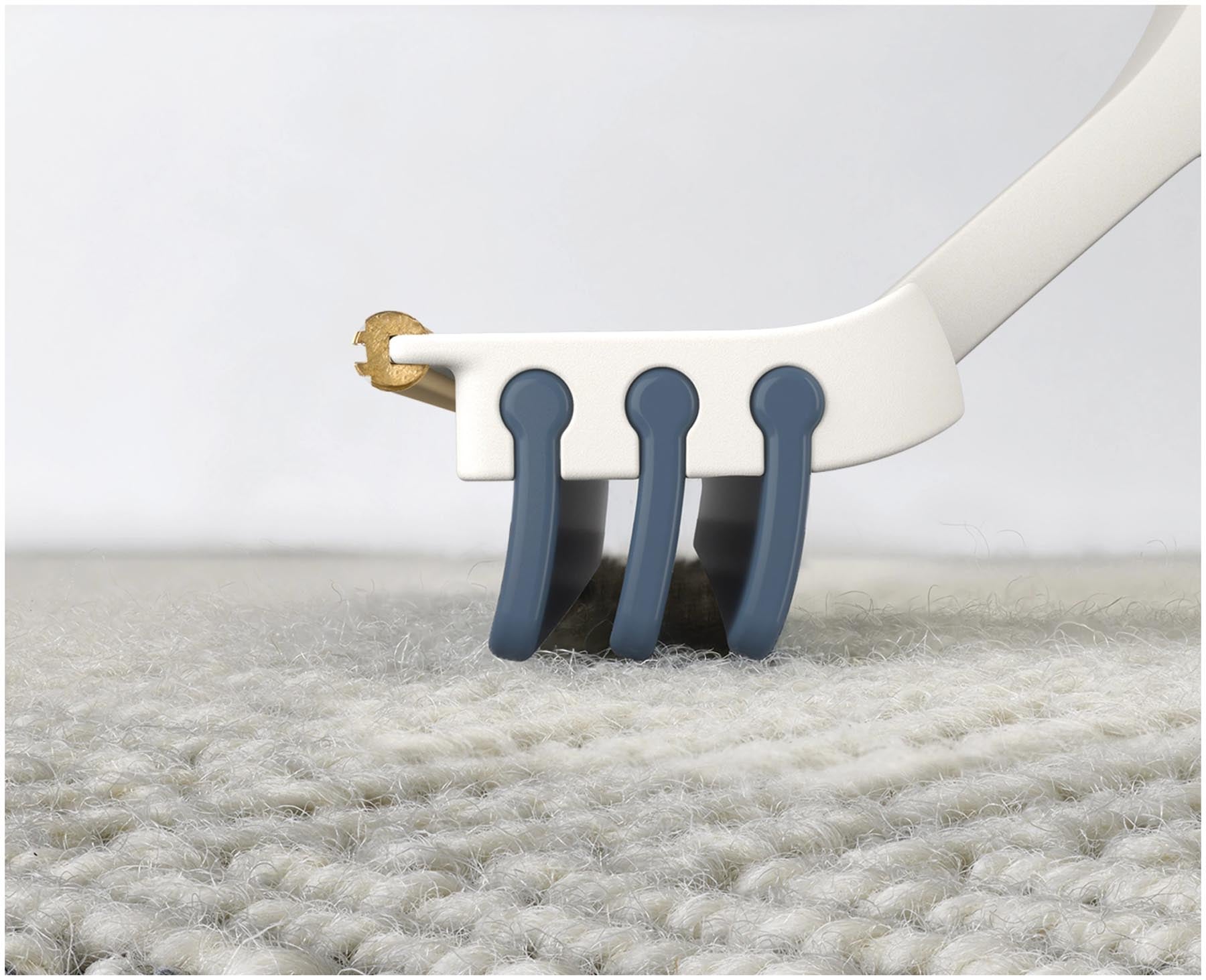 Praktisches hellgraues 2-in-1 Teppichreinigungsgadget von Joseph Joseph, perfekt für schnelle und effektive Teppichpflege.