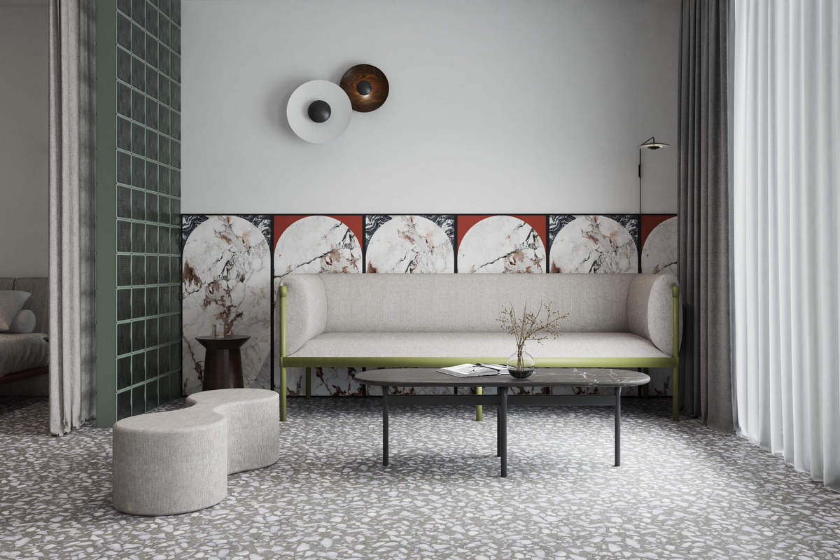 Elegantes 2er-Sofa Stilt SIS2 mit niedriger Rückenlehne, ideal für stilvolle Wohnräume. Helle Farben und feine Holzfüße schaffen ein modernes Ambiente.