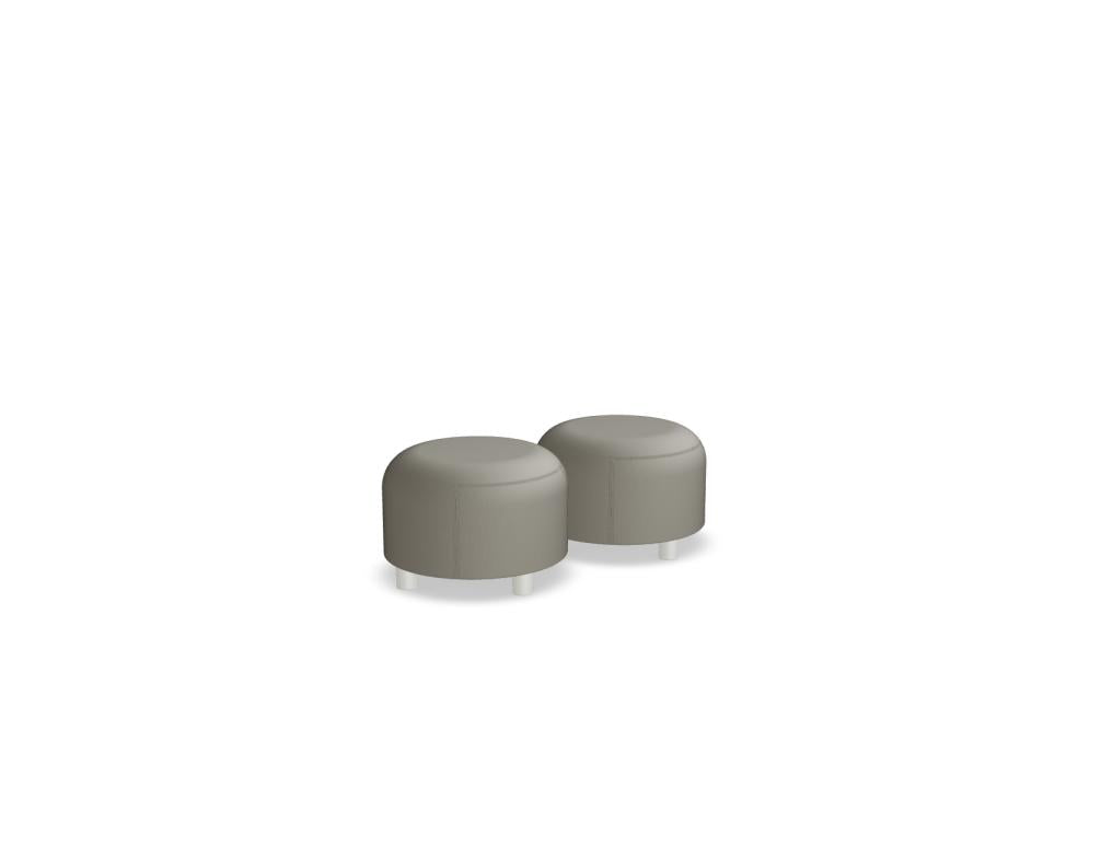 Fotografie des modularen Pouf-Systems Dots DTSU01 von MDD in neutralem Wohnraum, mehrere Stoff-Poufs in der Pouf-Reihe, flexibel stapel- oder anordnungsbar, modernes Design, Hellgraue/Beigetöne mit schlanken Beinen