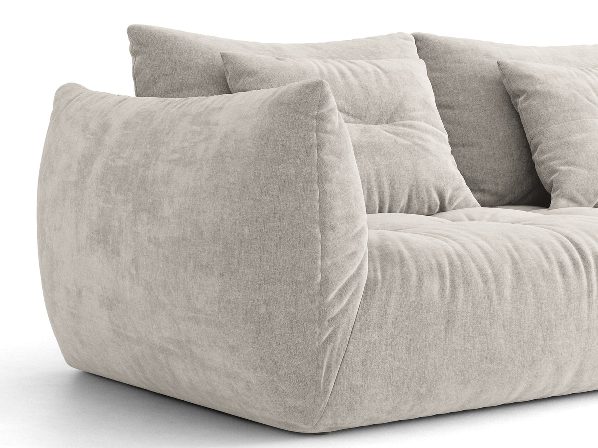 Eckmodul des Bloom Sofas von Micadoni in leichtem Beige, Bezug aus Casino Velours-Stoff, schwarze Kunststoffbeine, gepolsterte Rückenlehne.