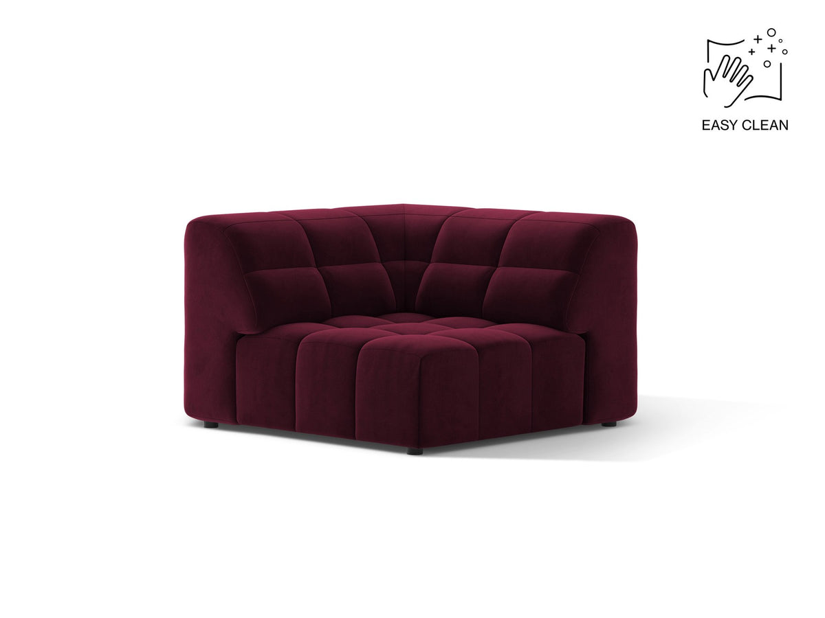 Eckmodul eines modularen Sofas in leichtem Beige mit Chenille-Bezug Eden, schwarzen Kunststoffbeinen und niedriger Rückenlehne.