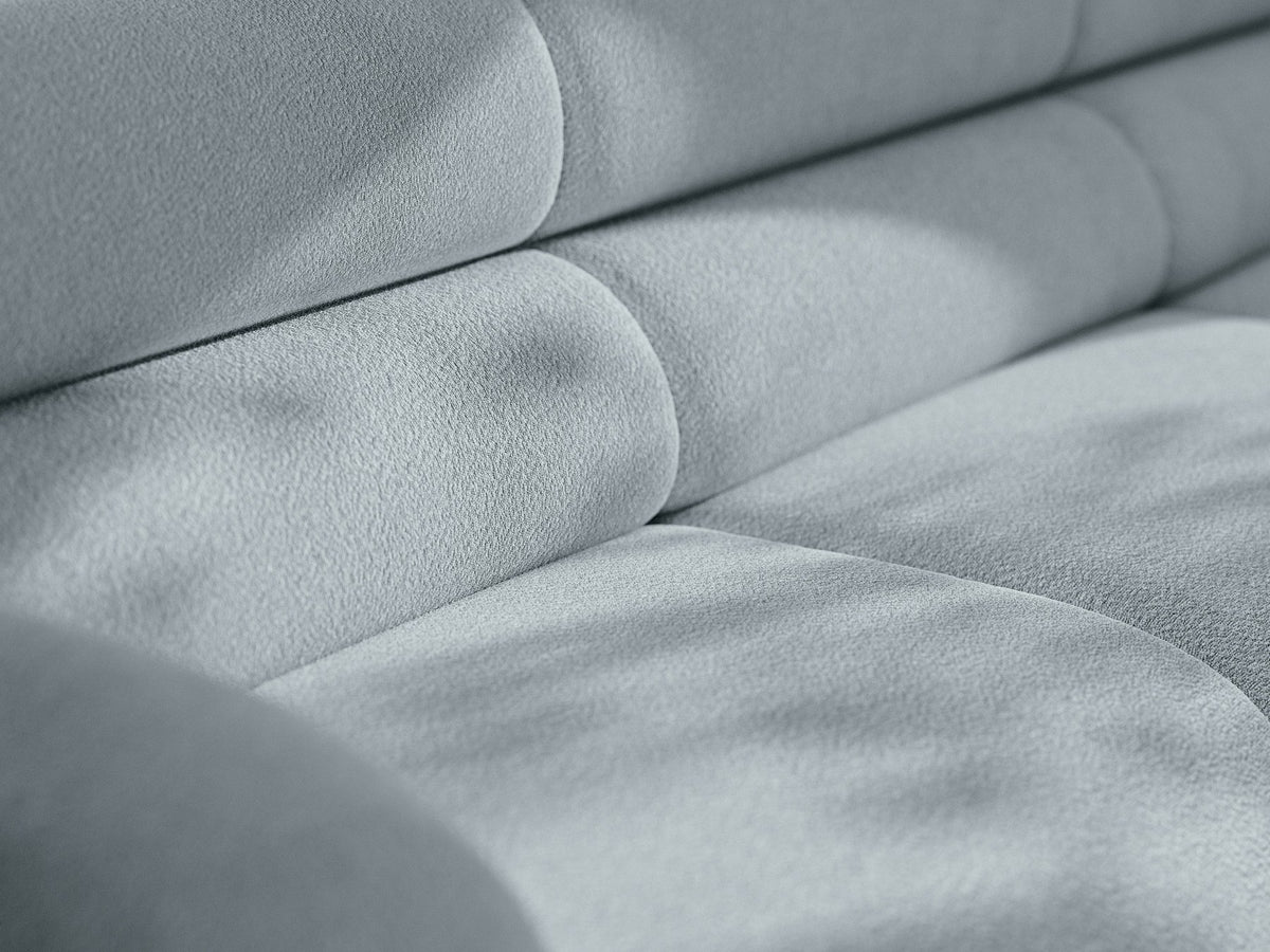 Armloses Samtmodul-Sofaelement Neo von Micadoni in dunklem Olivgrün, mit schwarzen Kunststoffbeinen, Teil eines modularen Sofasystems.