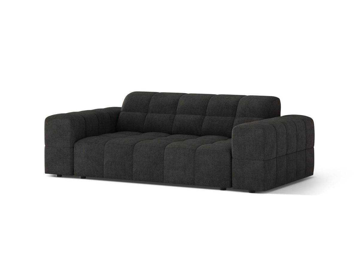 Beiges 2er Sofa Jennifer von Micadoni mit Chenille-Bezug, schwarzen Kunststoffbeinen und gepolsterter Rückenlehne auf hellem Hintergrund fotografiert.