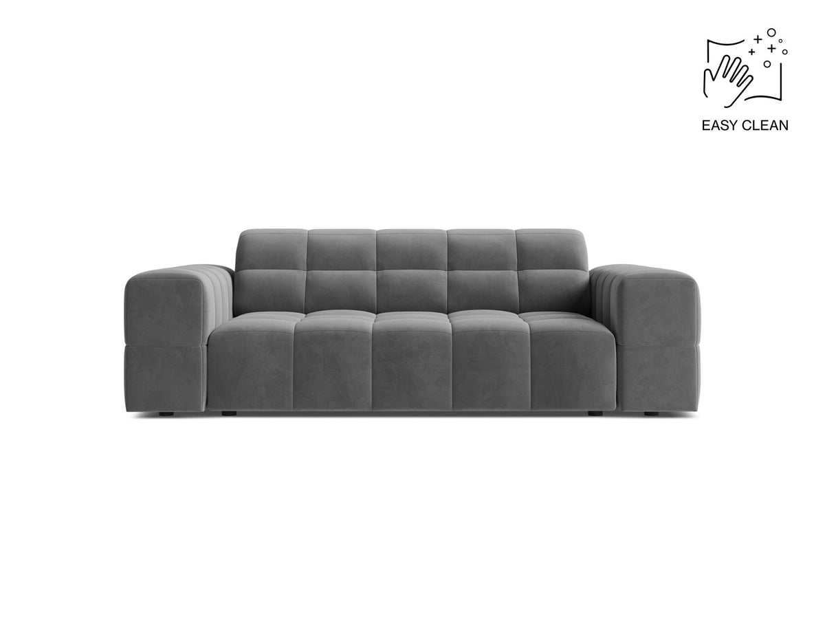 Beiges 2er Sofa Jennifer von Micadoni mit Chenille-Bezug, schwarzen Kunststoffbeinen und gepolsterter Rückenlehne auf hellem Hintergrund fotografiert.