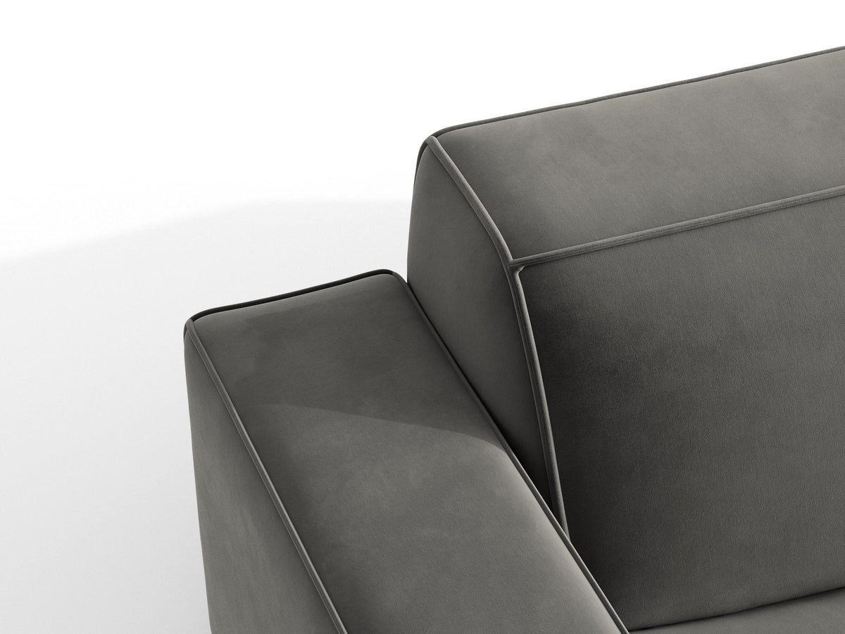 Zweisitzer-Sofa Jodie von Micadoni mit beigem Samtbezug, schwarzen Kunststoffbeinen und gepolsterter Rückenlehne, Frontalansicht.