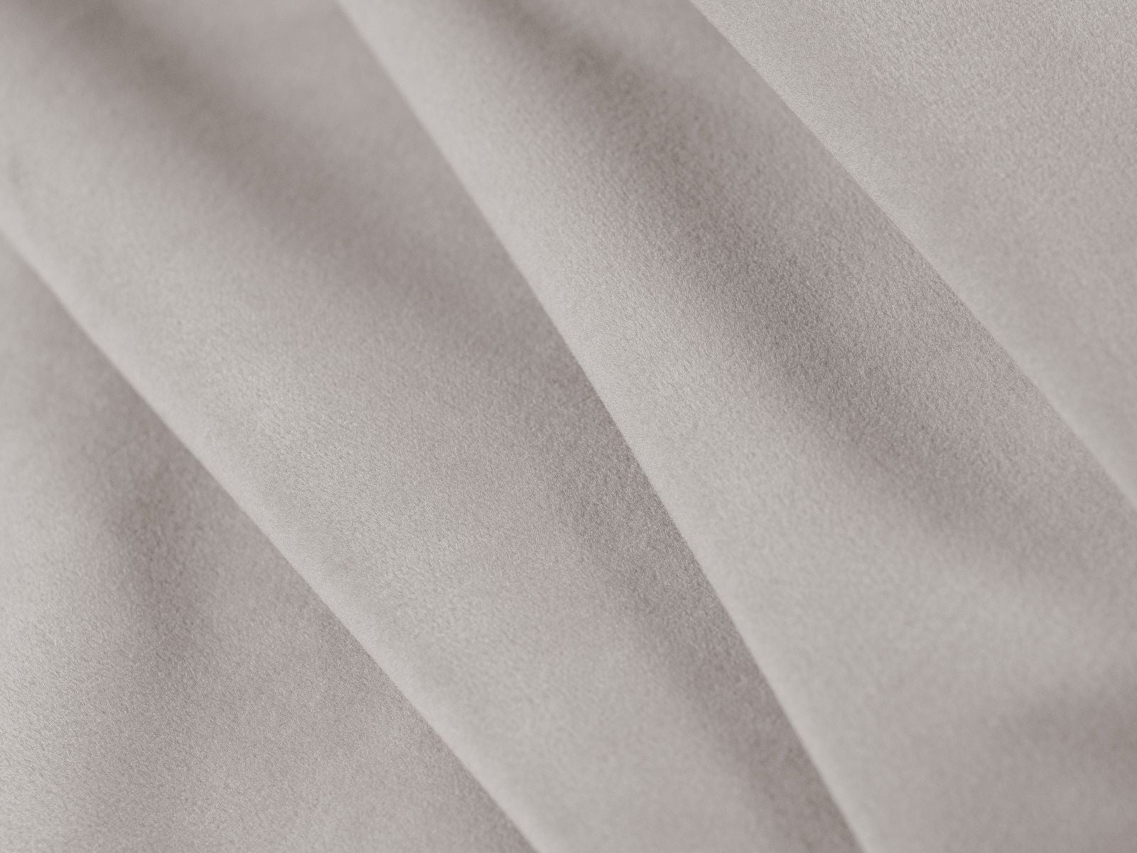 Modernes 3-Sitzer Bettsofa Dreamy in zeitlosem Grau, perfekt für entspannte Abende und als komfortable Schlaflösung für Übernachtungsgäste.