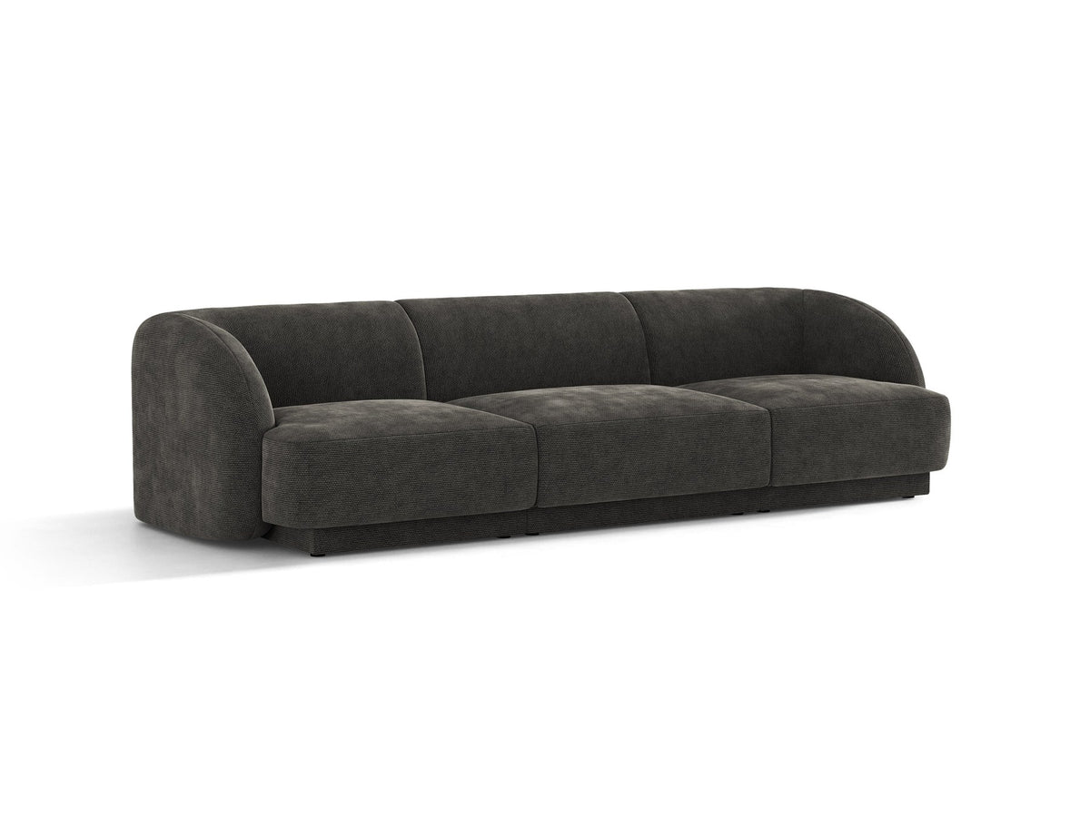Dunkelbeiges 3er Sofa Miley von Micadoni mit Bluvel-Stoffbezug, schwarzen Kunststoffbeinen und gepolsterter Rückenlehne, Frontalansicht.
