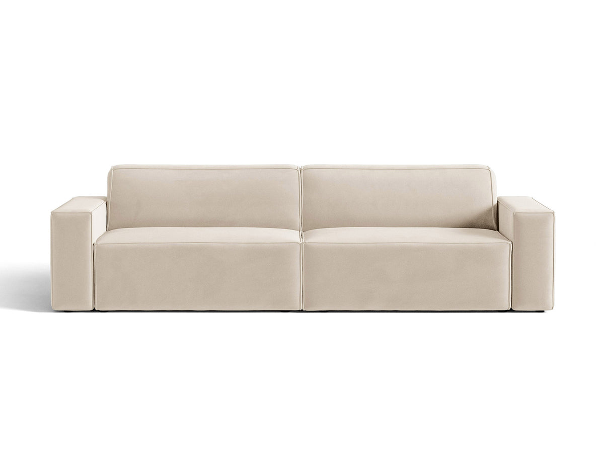 Modulares 4er Sofa Jodie von Micadoni in leichtem Beige mit Venus Samtstoff, schwarzen Kunststoffbeinen und niedriger Rückenlehne.