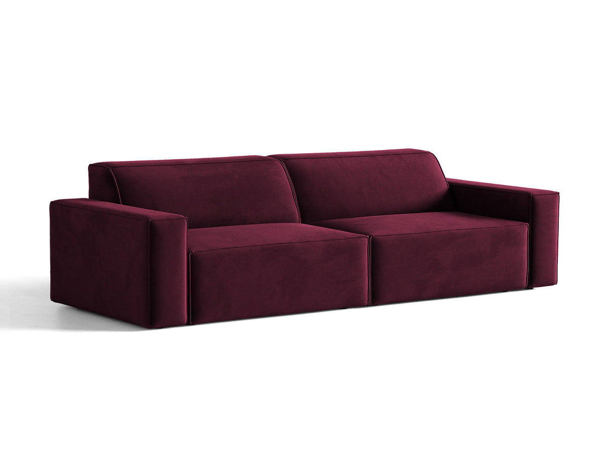Modulares 4er Sofa Jodie von Micadoni in leichtem Beige mit Venus Samtstoff, schwarzen Kunststoffbeinen und niedriger Rückenlehne.