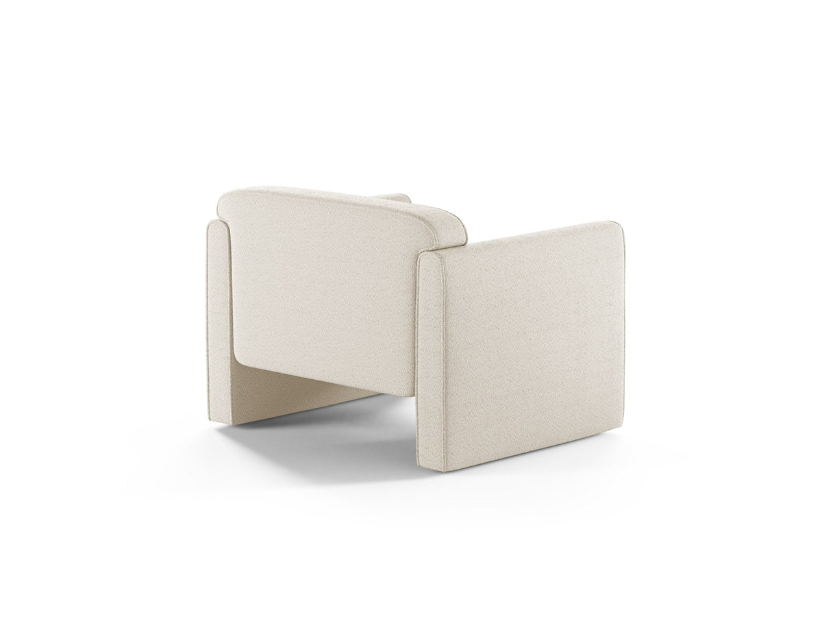 Beige Armsessel Abby von Micadoni mit strukturiertem Heritage-Stoffbezug, schwarzen Kunststoffbeinen und runder, kompakter Formgebung.