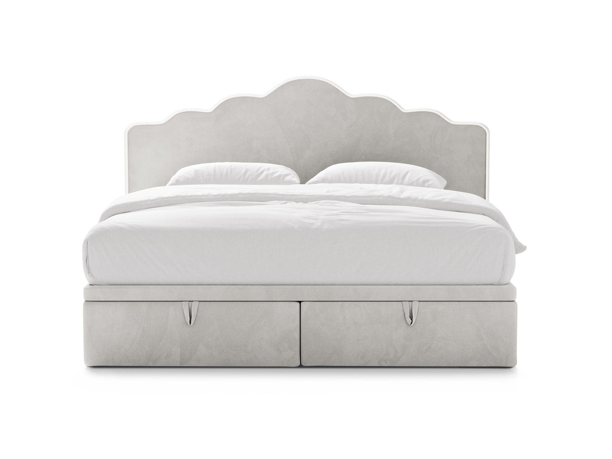 Polsterbett Dream mit hohem gepolstertem Kopfteil, elfenbeinfarbener Samtstoff-Bezug, schwarze Kunststoffbeine und Bettkasten mit Stauraum.
