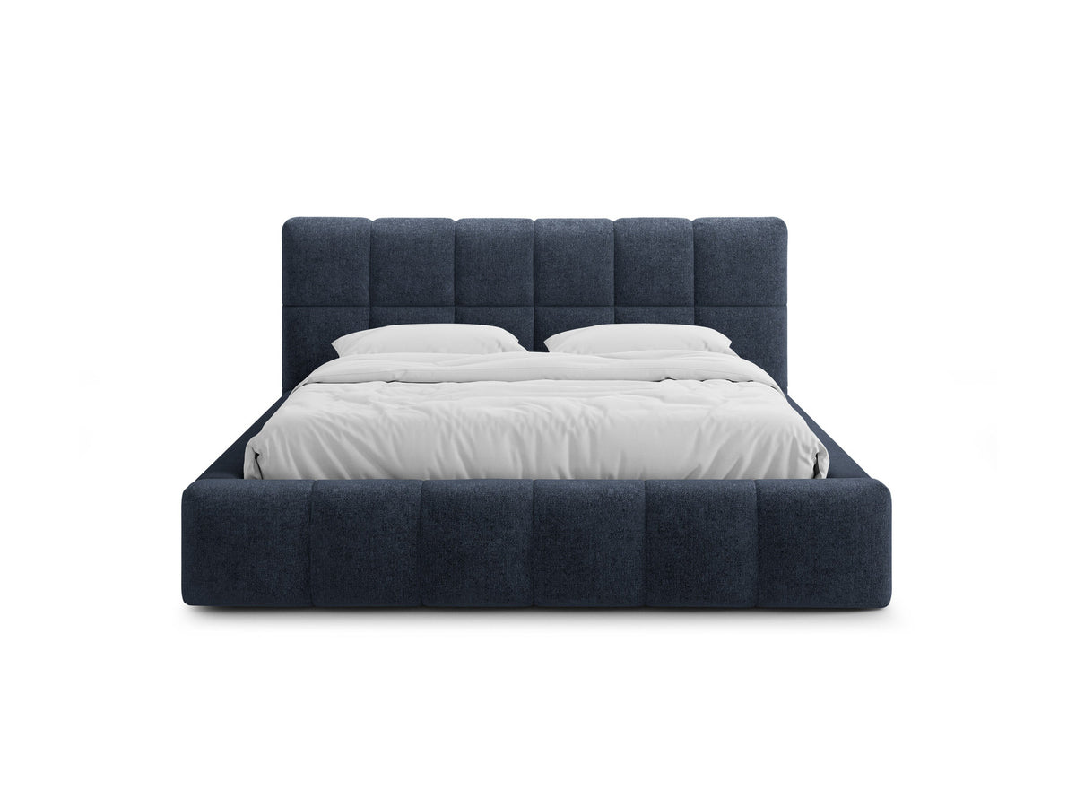 Bellis Ablagebett mit Kopfteil von Micadoni in Gelb, Bezug aus Bluvel-Stoff, schwarze Kunststoffbeine, gepolstertes Kopfteil mit Ziernähten.