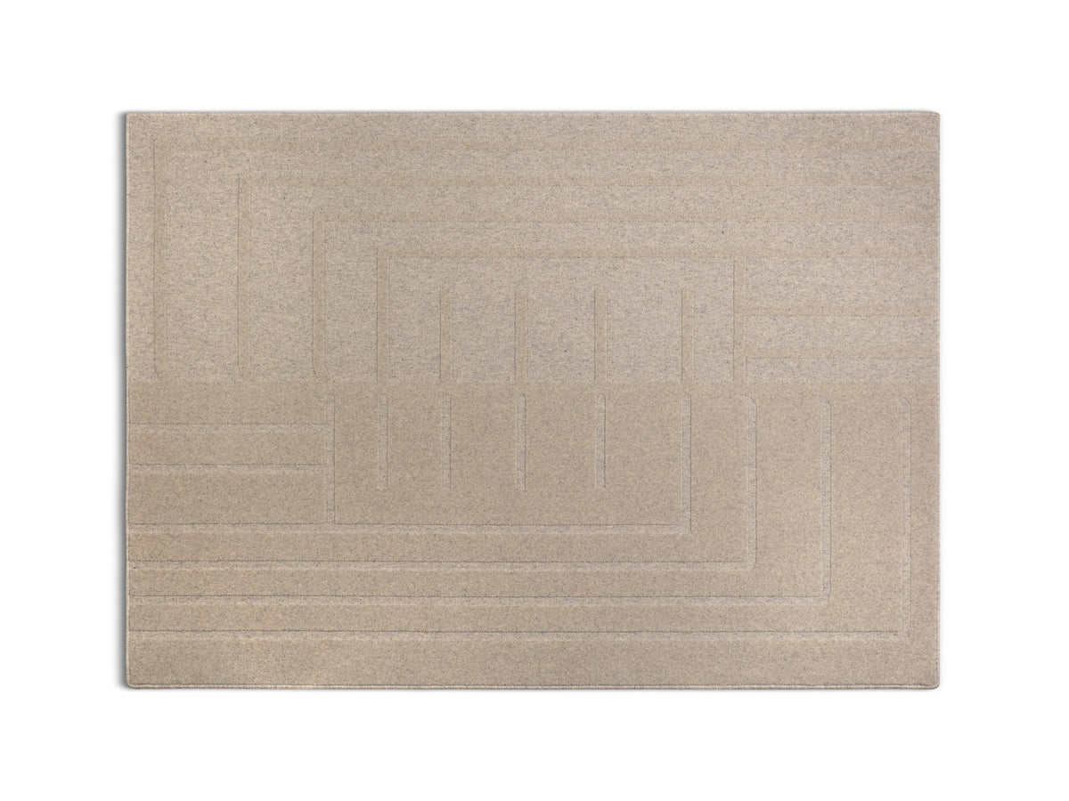 Hellgrauer Wollteppich Kasai von Micadoni, rechteckige Form, 300x200 cm, dichter Flor, sauber verarbeitete Kanten auf hellem Boden.