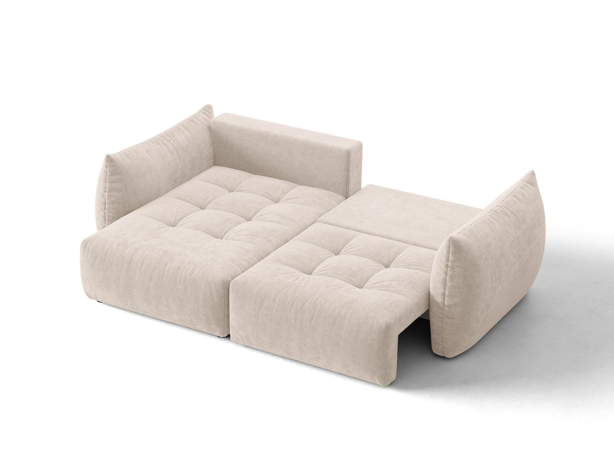 Ecksofa Bloom in Sand mit Velours-Bezug, schwarzen Kunststoffbeinen und ausklappbarer Schlaffunktion samt Bettkasten unter der Sitzfläche.