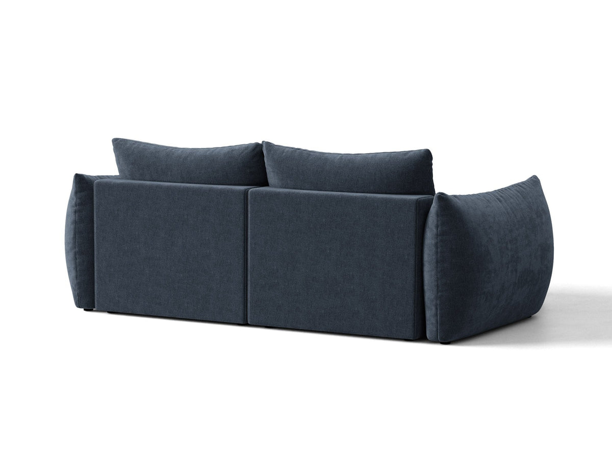 Ecksofa Bloom in Sand mit Velours-Bezug, schwarzen Kunststoffbeinen und ausklappbarer Schlaffunktion samt Bettkasten unter der Sitzfläche.
