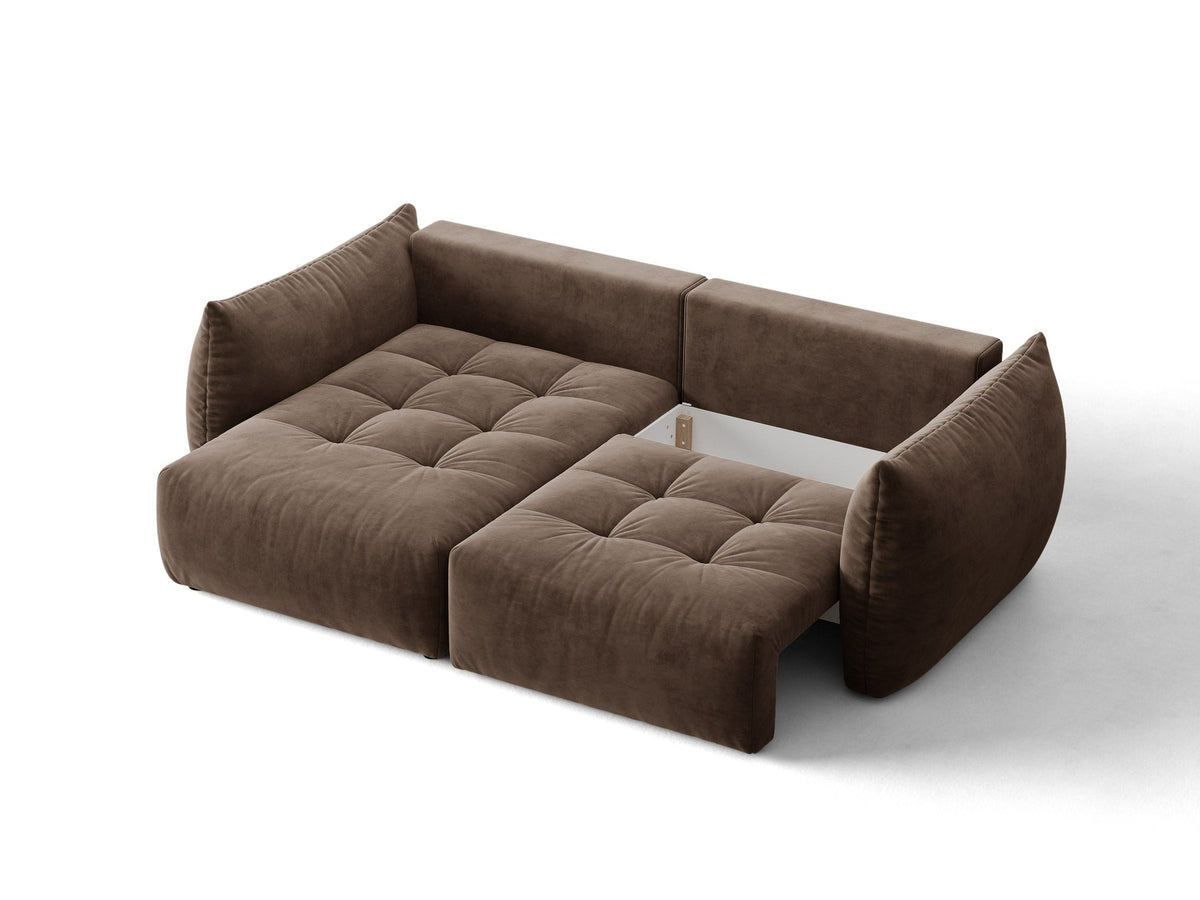 Ecksofa Bloom in Sand mit Velours-Bezug, schwarzen Kunststoffbeinen und ausklappbarer Schlaffunktion samt Bettkasten unter der Sitzfläche.