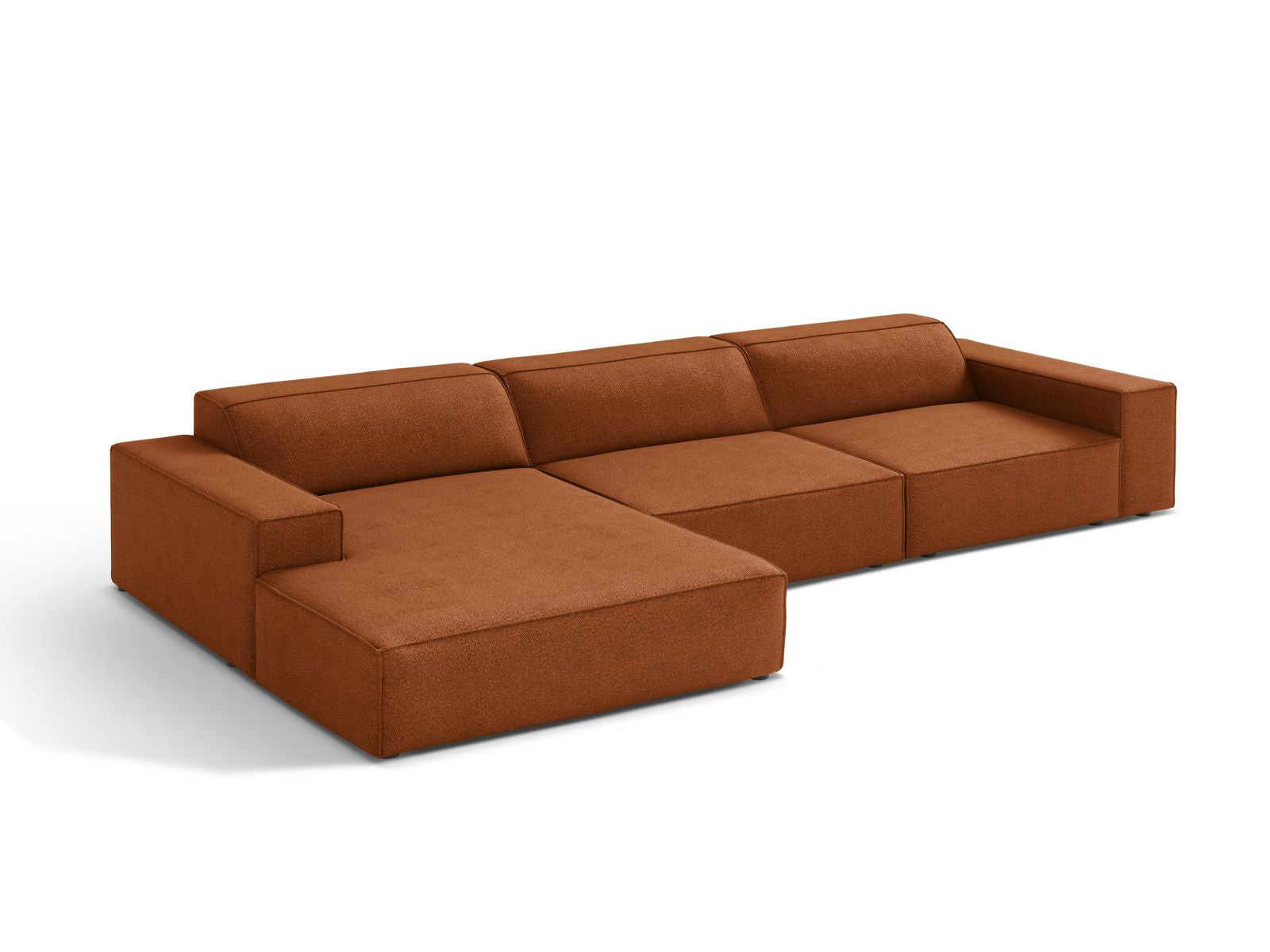 Elegantes Jodie Boucle Ecksofa links in warmem Terracotta, ideal für stilvolle Wohnräume. Modulares Design für individuelle Anpassung.