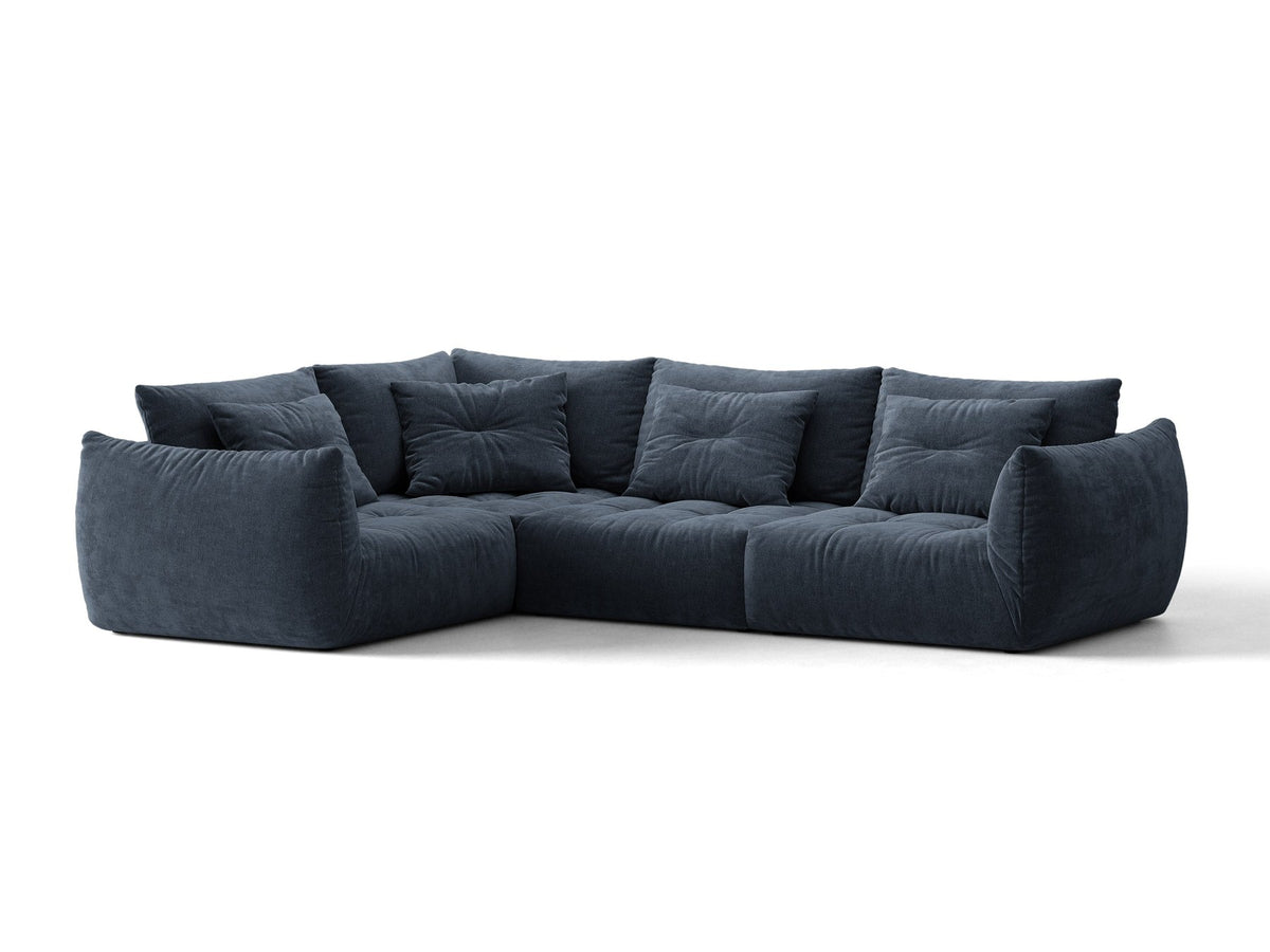 Modulares Ecksofa links Bloom von Micadoni in leichtem Beige, Veloursstoff Casino Pearl, schwarze Kunststoffbeine, tiefe Sitzfläche.