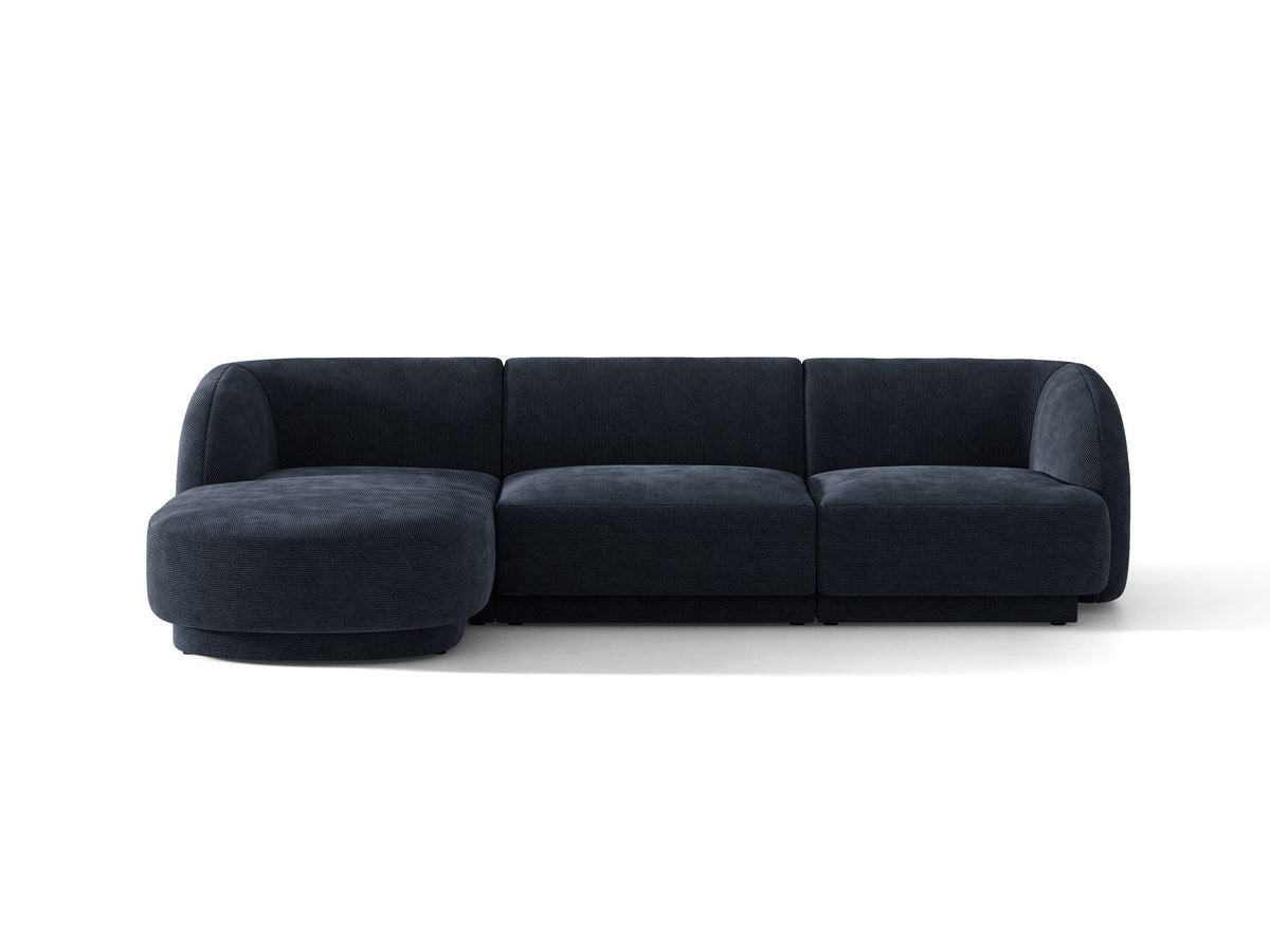 Miley Linkes Ecksofa von Micadoni, L-Sofa links in Dunkelbeige mit Bluvel-Stoffbezug und schwarzen Kunststoffbeinen, Frontalansicht.