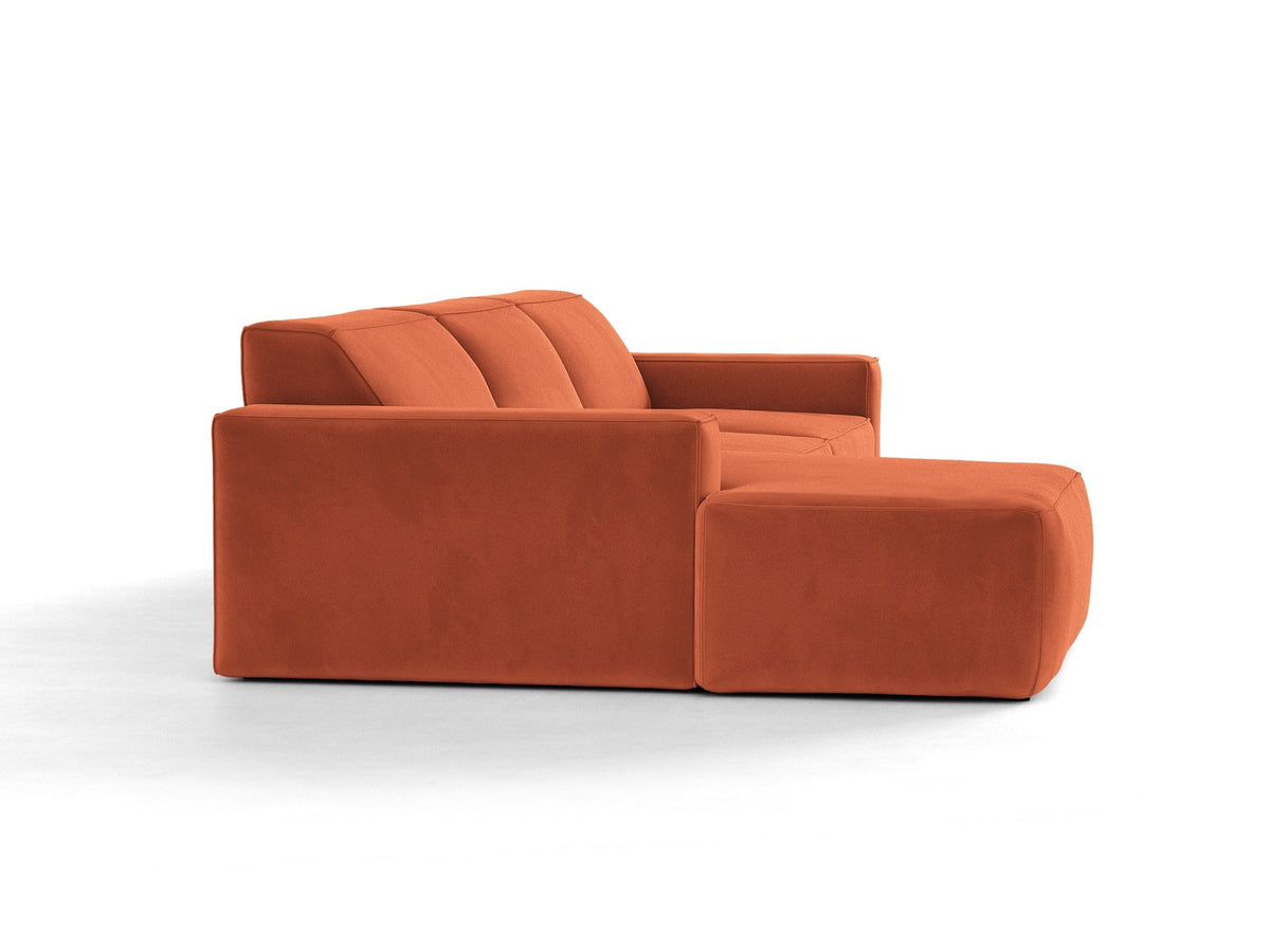 Modulares Ecksofa links von Micadoni in leichtem Beige mit Venus-Samtstoff-Bezug, schwarzen Kunststoffbeinen und niedriger Rückenlehne.