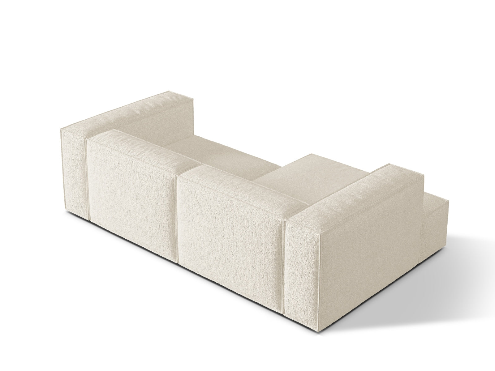 Elegantes Nuria Boucle L-Sofa links in Ivory-Monet, ideal für entspannte Abende und geschmackvolle Wohnräume, erhältlich bei KAQTU.