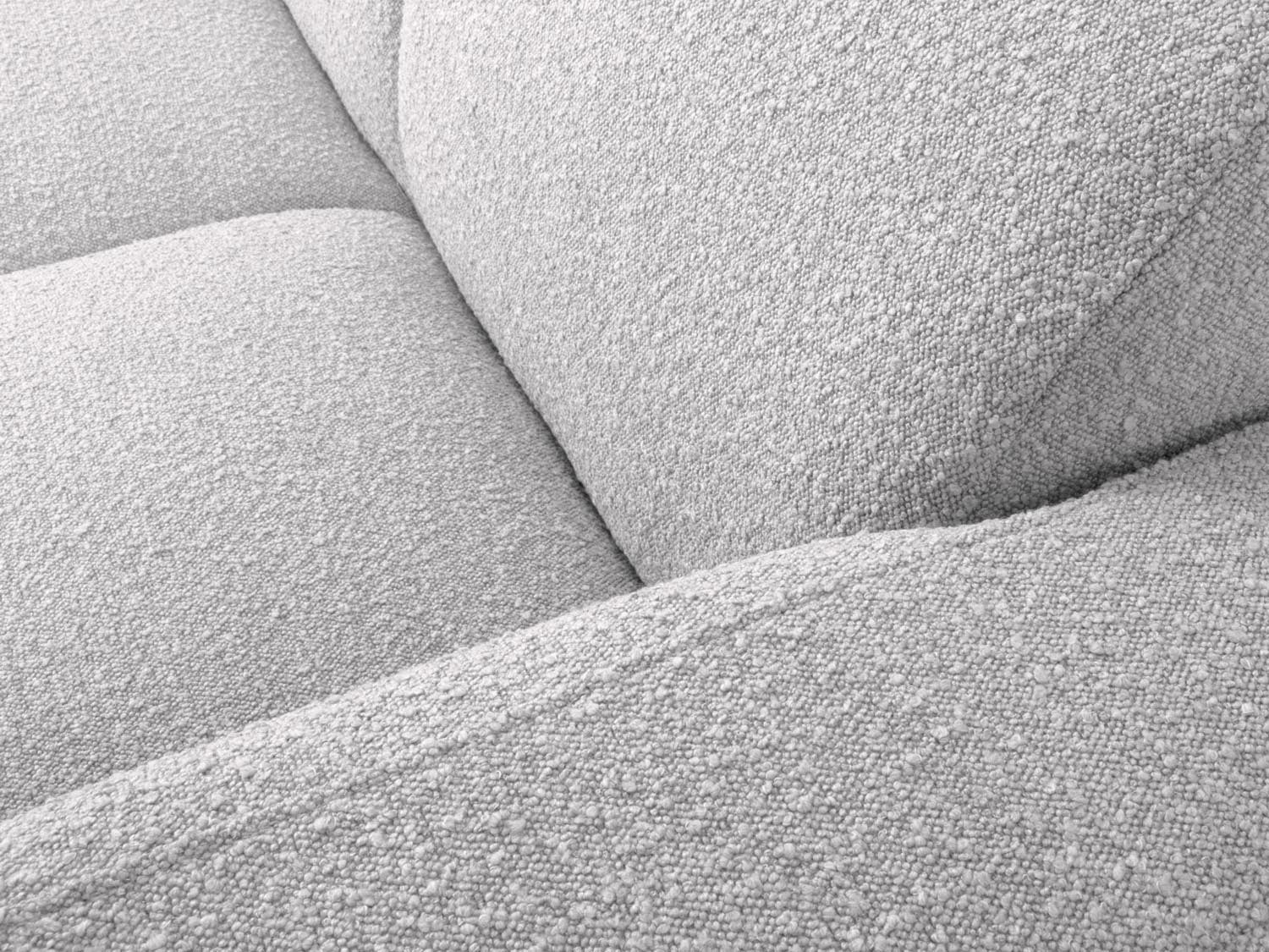 Elegantes Molino Boucle Ecksofa in hellem Grau, 4-Sitzer, rechtsseitig, ideal für stilvolle und einladende Wohnräume.