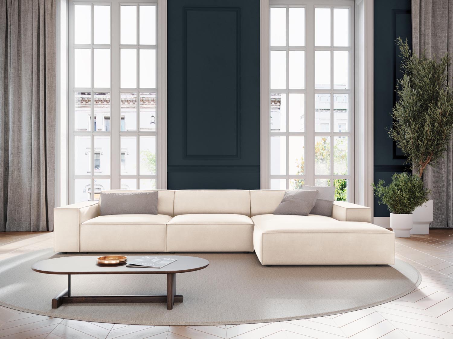Elegantes Jodie Velour Ecksofa in Light Beige, modulares Design, ideal für stilvolle Wohnräume, präsentiert in einer gemütlichen Atmosphäre.