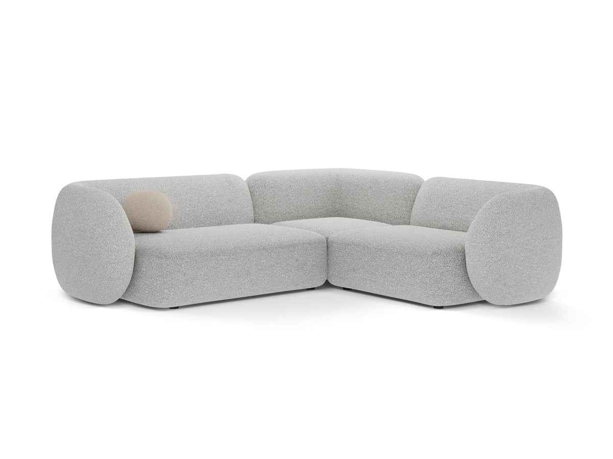 Weisses Ecksofa rechts von Micadoni aus der Kate-Serie mit strukturiertem Bouclé-Stoff, schwarzen Kunststoffbeinen und modularem Aufbau.