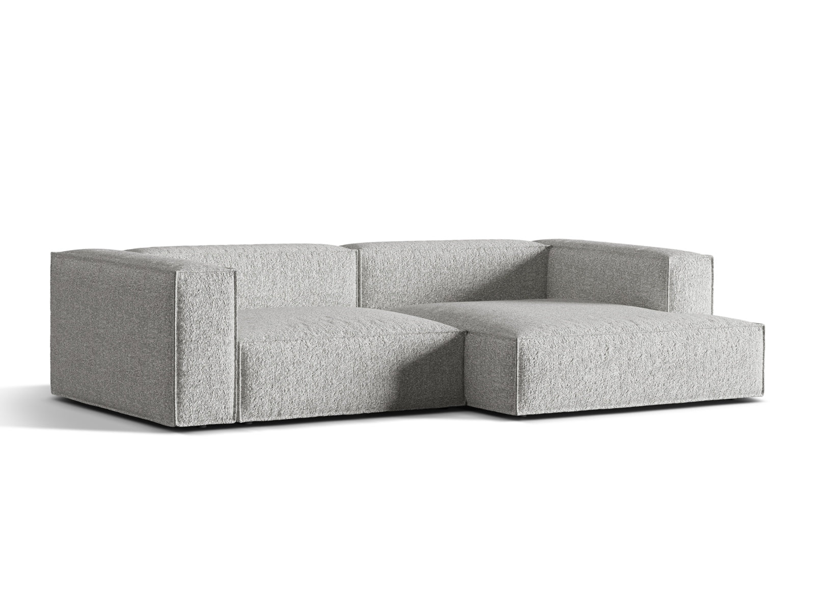 Elegantes Nuria Boucle Ecksofa in Silber, modular und komfortabel, ideal für stilvolle Wohnräume. Perfekt für entspannte Abende.