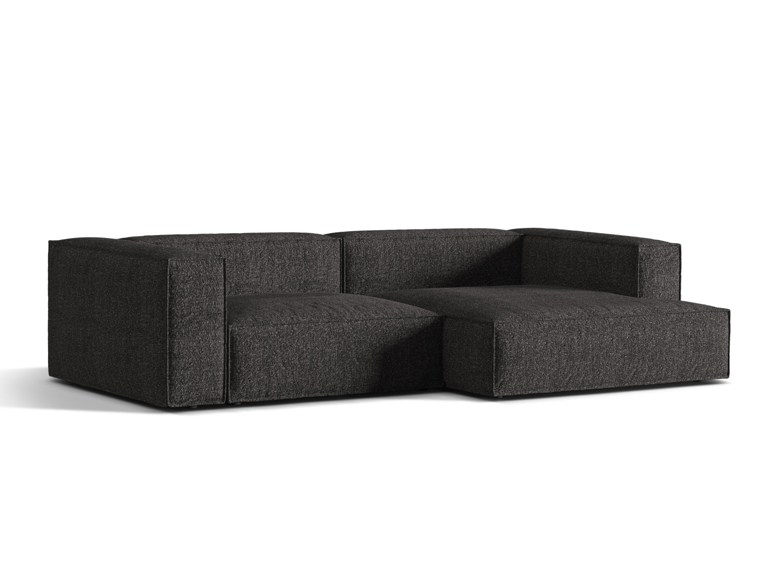 Elegantes Nuria Boucle Ecksofa in Anthrazit, modular und komfortabel, ideal für stilvolle Wohnräume. Perfekt für entspannte Abende.