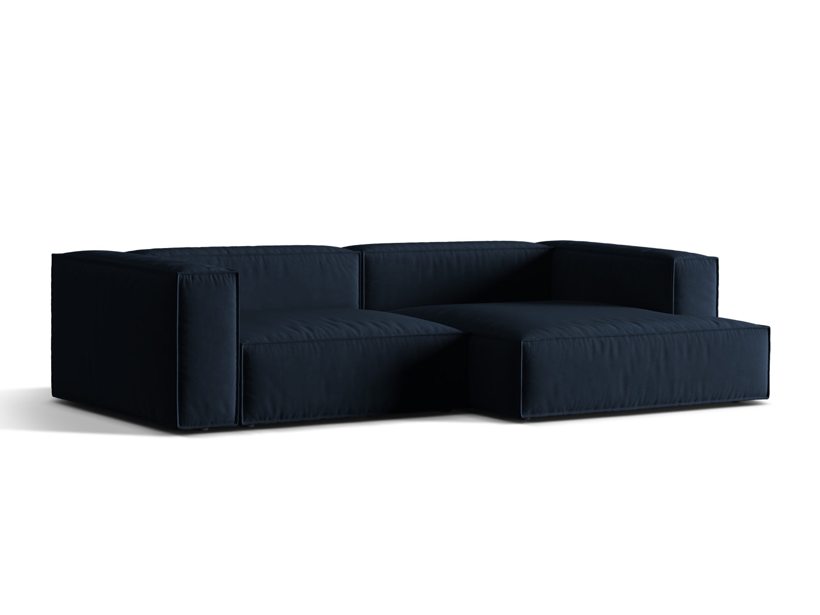 Elegantes Nuria Velour Ecksofa in Dunkelblau, modular und komfortabel, ideal für stilvolle Wohnräume. Perfekt für entspannte Abende.