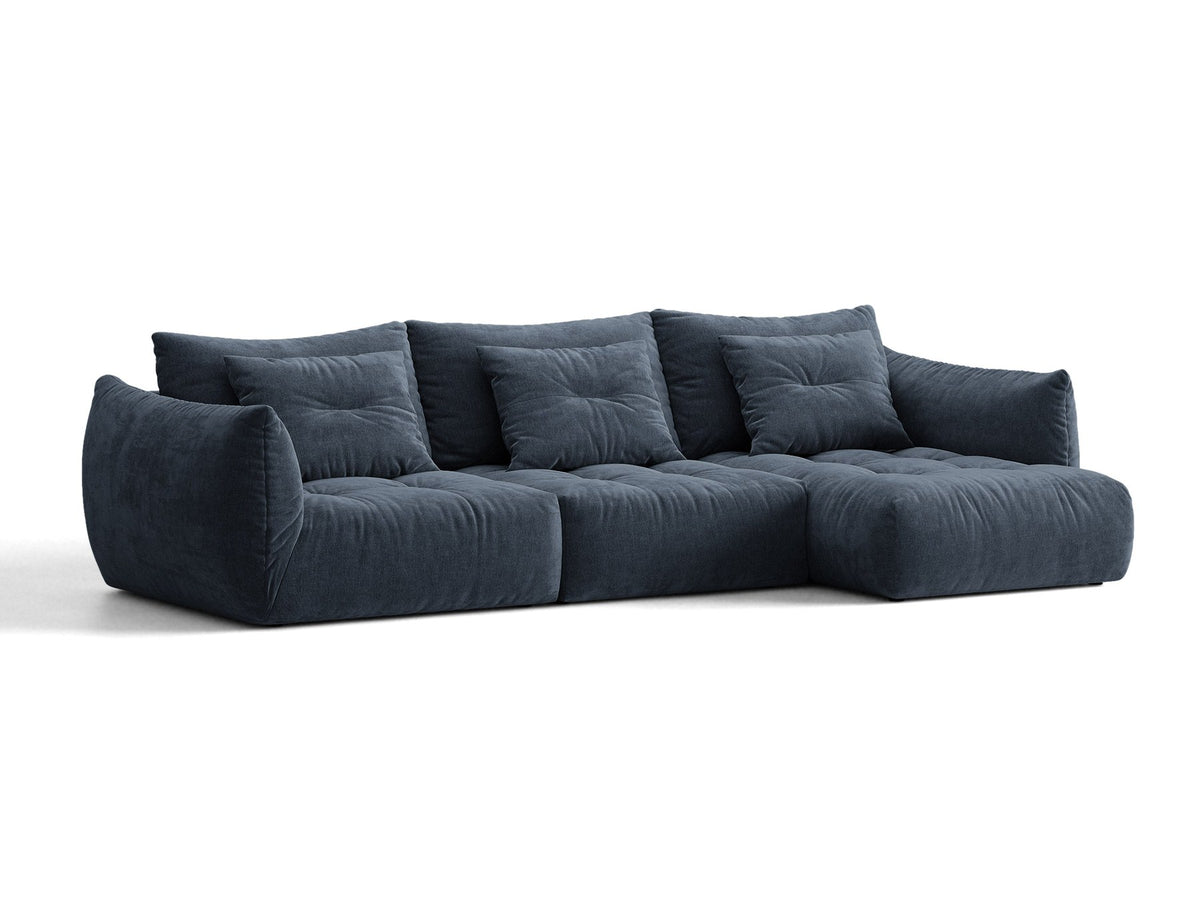 Beiges L-Sofa rechts Bloom von Micadoni mit Veloursstoff-Bezug Casino Pearl, schwarzen Kunststoffbeinen und sichtbarem Staufach unter der Sitzfläche.