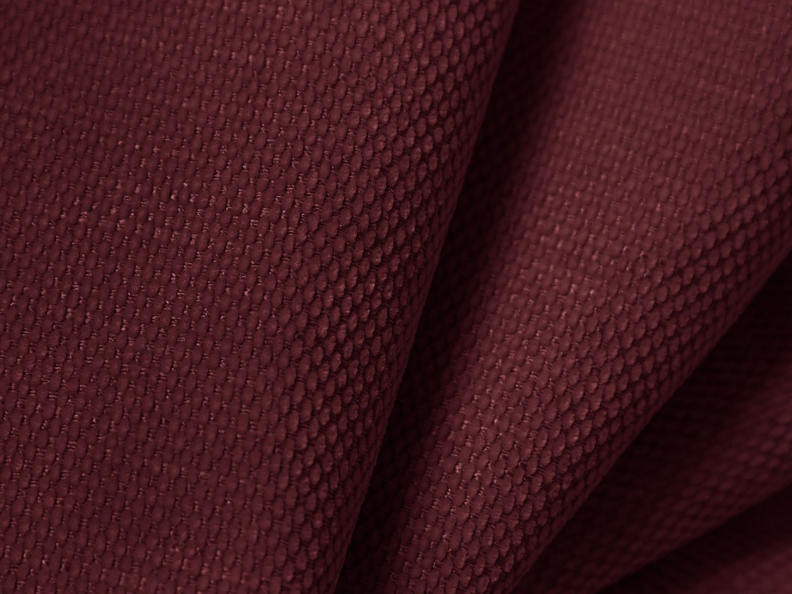 Elegantes 6-Sitzer Ecksofa Molino in sattem Bordeaux, linksseitig, ideal für stilvolle und einladende Wohnräume.
