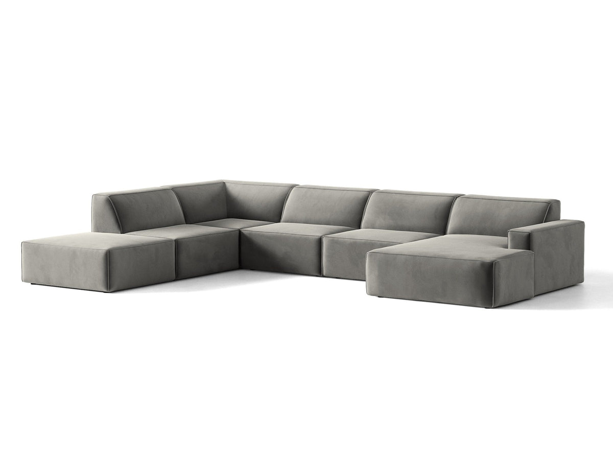 Modulares Ecksofa links Jodie von Micadoni in leichtem Beige mit Venus-Samtstoff, schwarzen Kunststoffbeinen und Panoramaform.