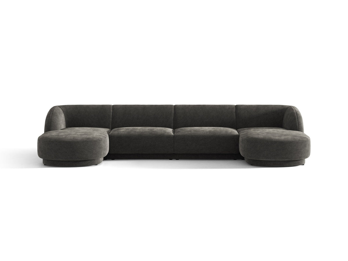 Dunkelbeiges Panorama-Ecksofa Miley von Micadoni mit Bluvel-Stoffbezug, L-Form, schwarzen Kunststoffbeinen und niedriger Rückenlehne.