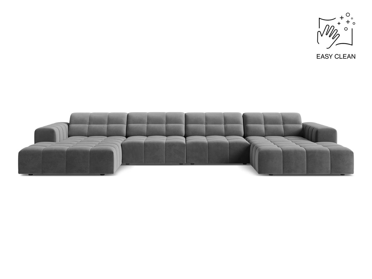 Panoramasofa Jennifer von Micadoni in leichtem Beige, grosses Ecksofa mit Stoffbezug Bluvel 22 und schwarzen Kunststoffbeinen.