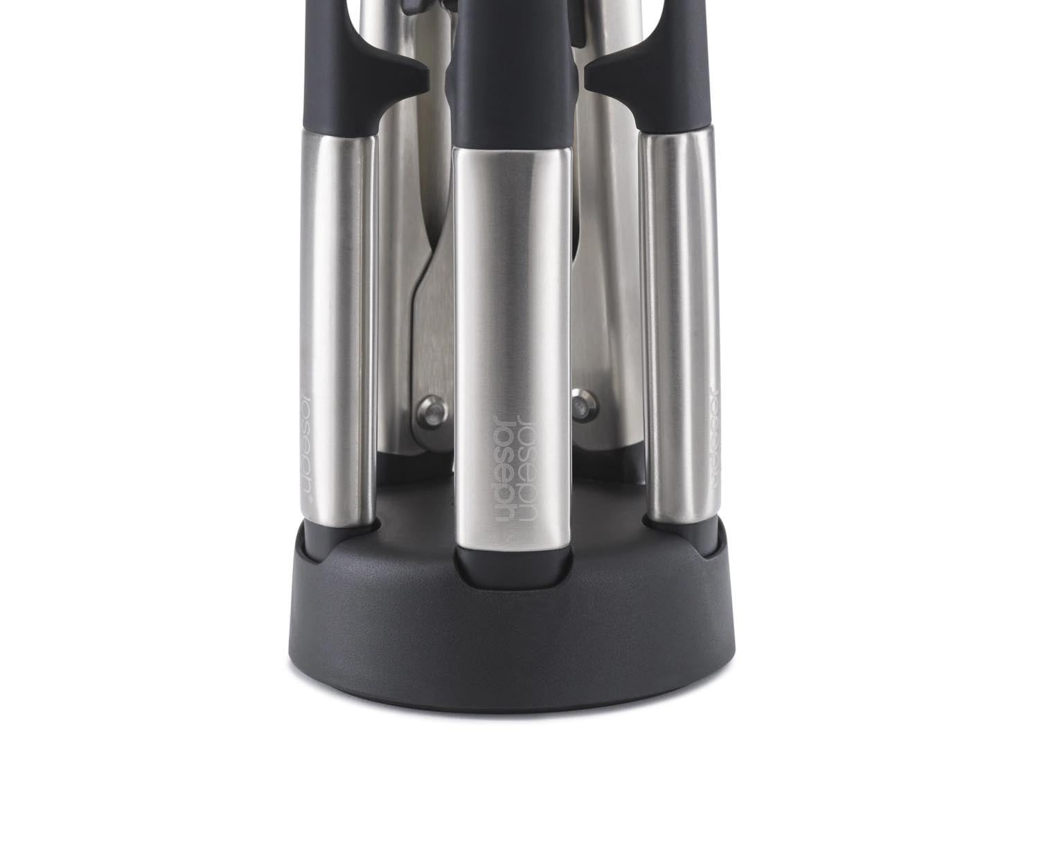 Modernes 5-teiliges Küchenutensilien-Set aus Silikon mit praktischem Ständer, perfekt für sauberes und effizientes Kochen.