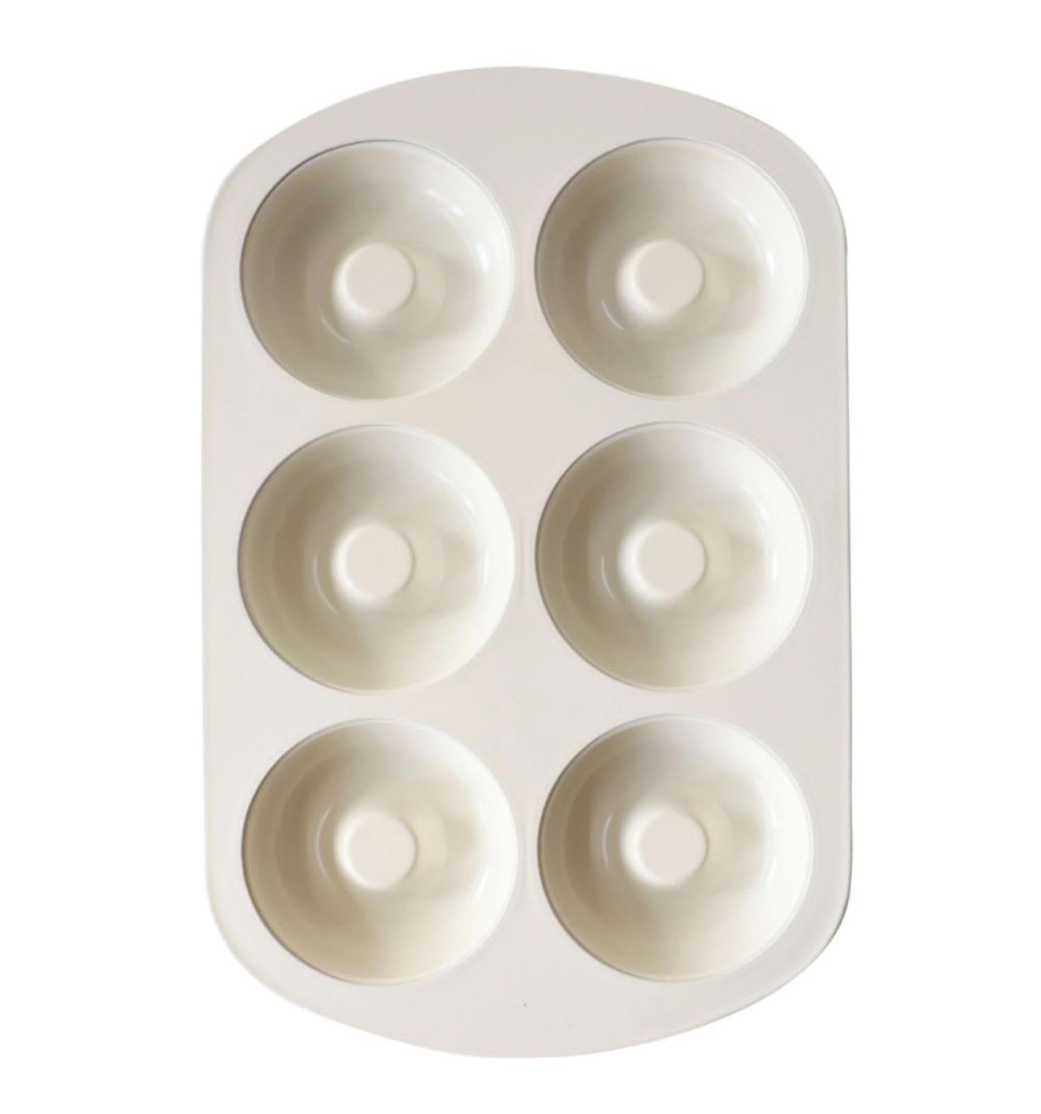Antihaftbeschichtete Backform für 6 Donuts von Scrap Cooking, ideal für gleichmäßiges Backen und einfache Reinigung.
