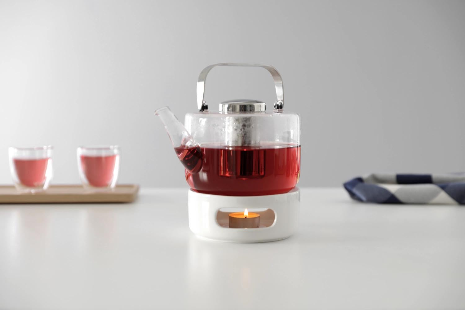 Weißes Porzellan-Teestövchen, 14 cm Durchmesser, 5,6 cm hoch, minimalistisch und funktional, perfekt für Teegenuss von Viva.