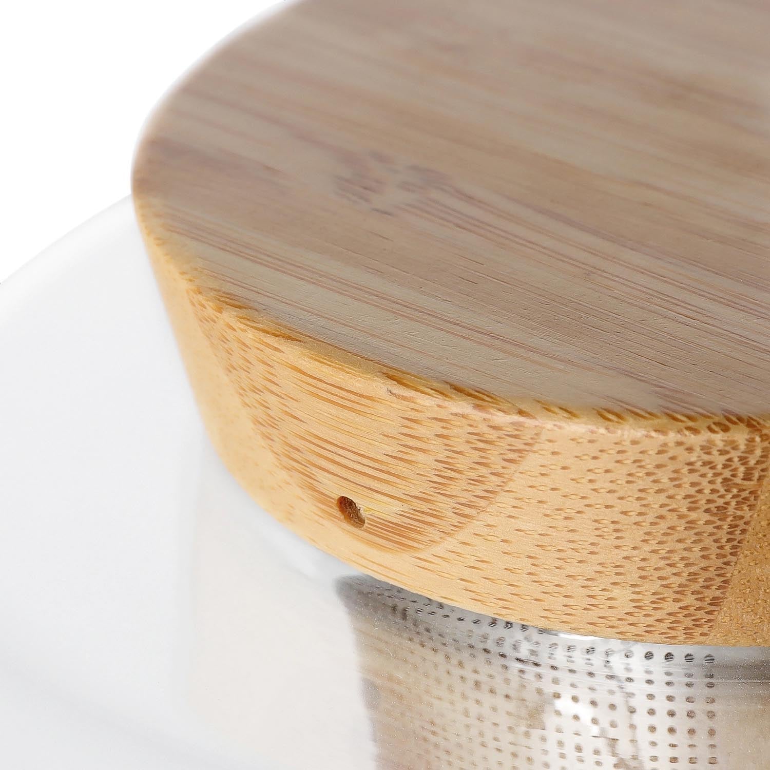 Eleganter Teekrug aus Borosilikatglas (1L) mit Holzdeckel, ideal für Teegenuss. Modernes Design trifft auf Funktionalität.