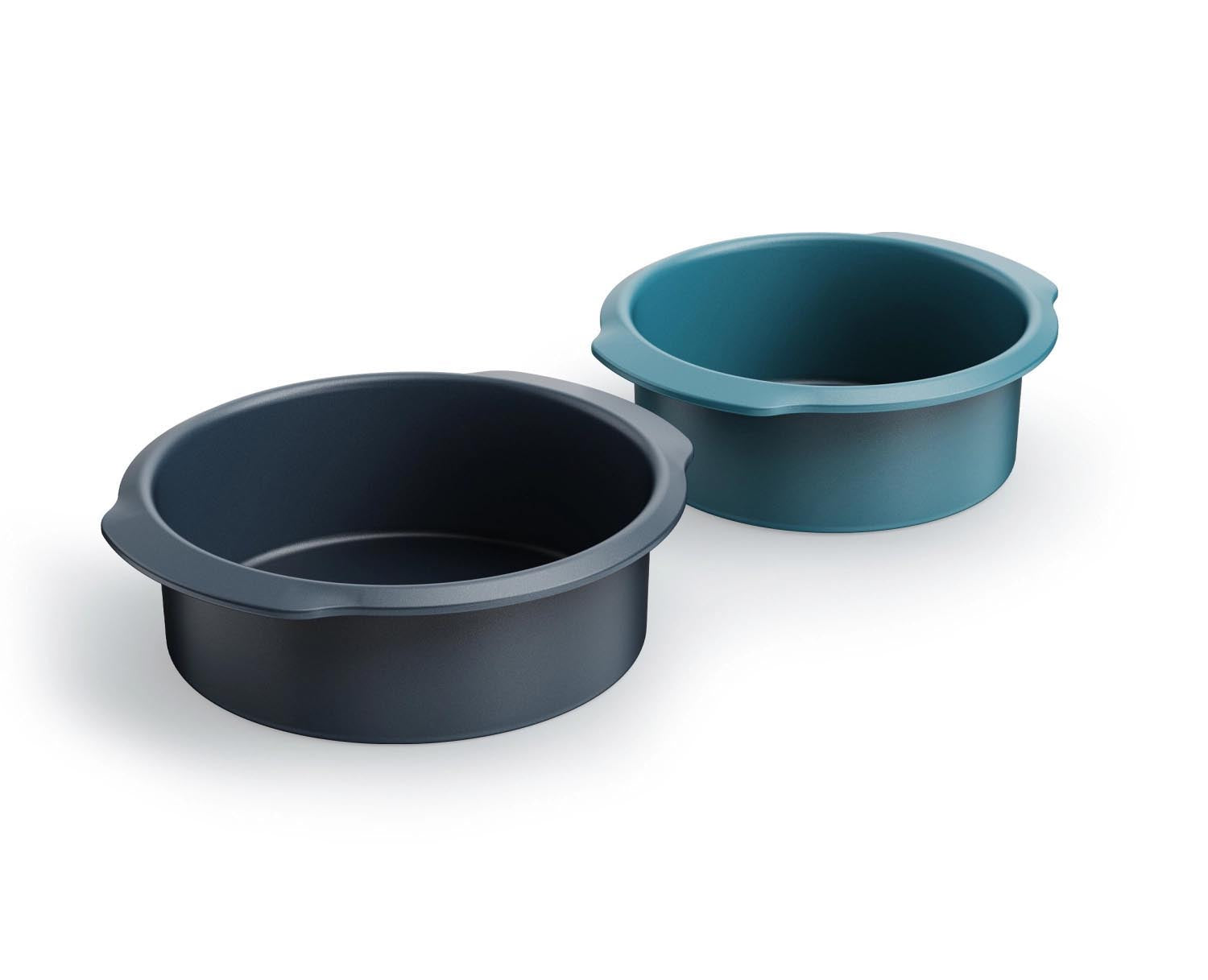 Set aus zwei runden Backformen (20 cm und 23 cm) von Joseph Joseph, perfekt für Kuchen, stapelbar, platzsparend und langlebig.