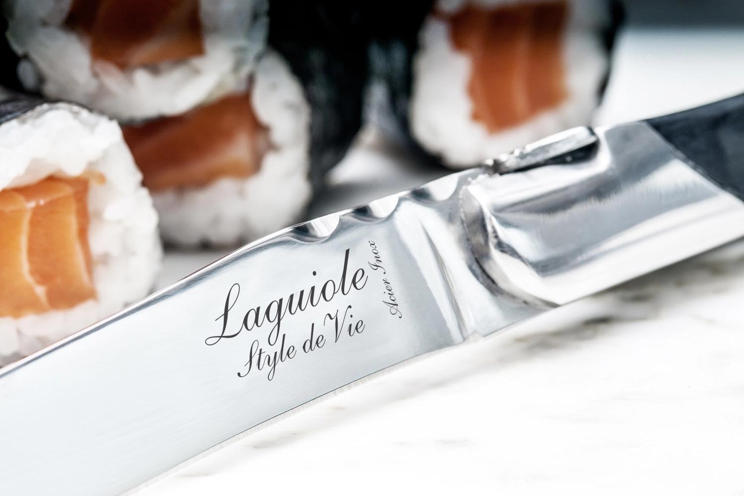 Elegantes Laguiole Steakmesser mit Griff aus schwarzem Ebenholz, ideal für stilvolles Speisen und höchste Ansprüche.