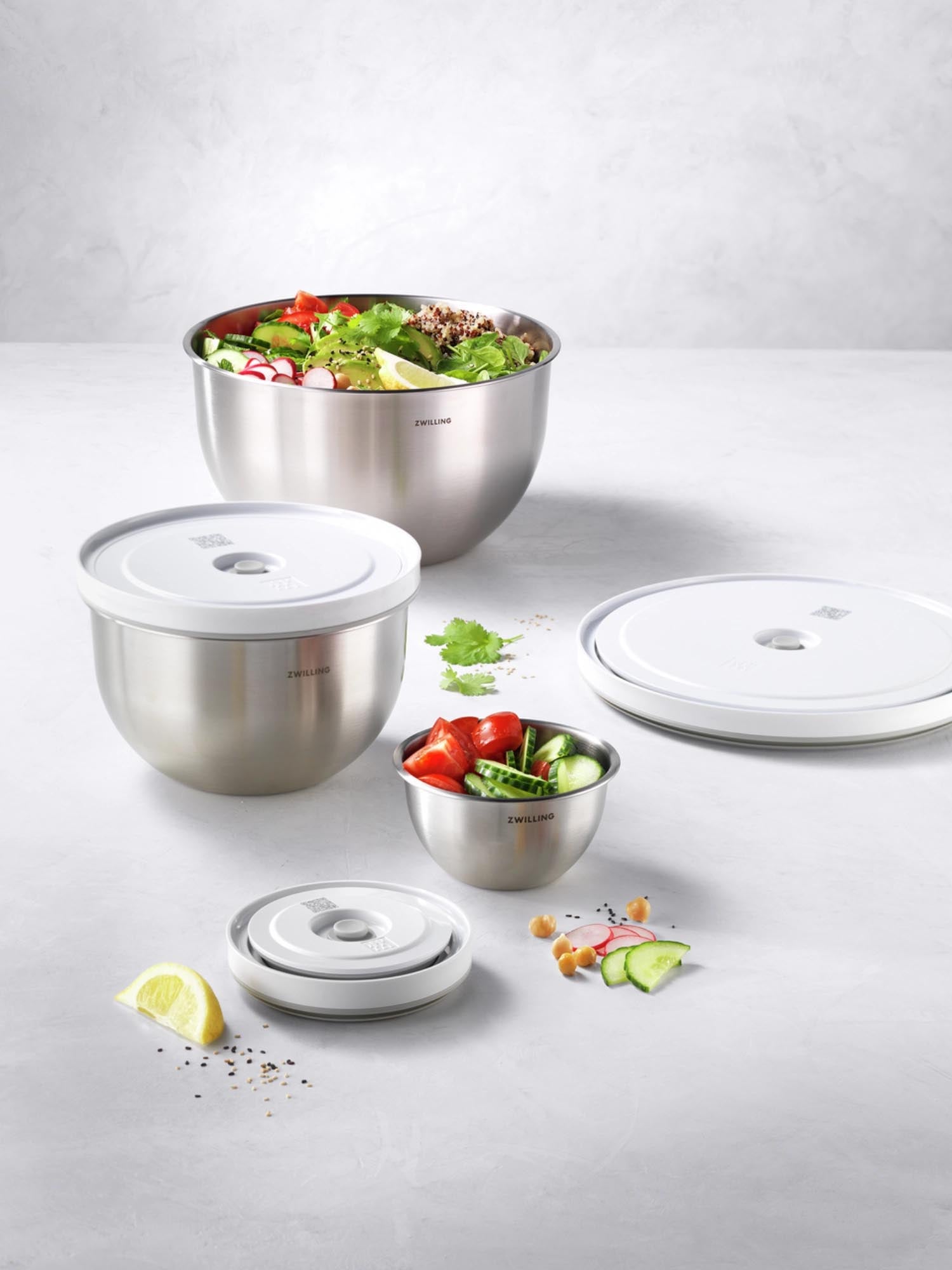 Elegantes 6-teiliges Vakuumschüssel-Set aus Edelstahl von Zwilling, perfekt für frische Aufbewahrung und modernes Küchendesign.