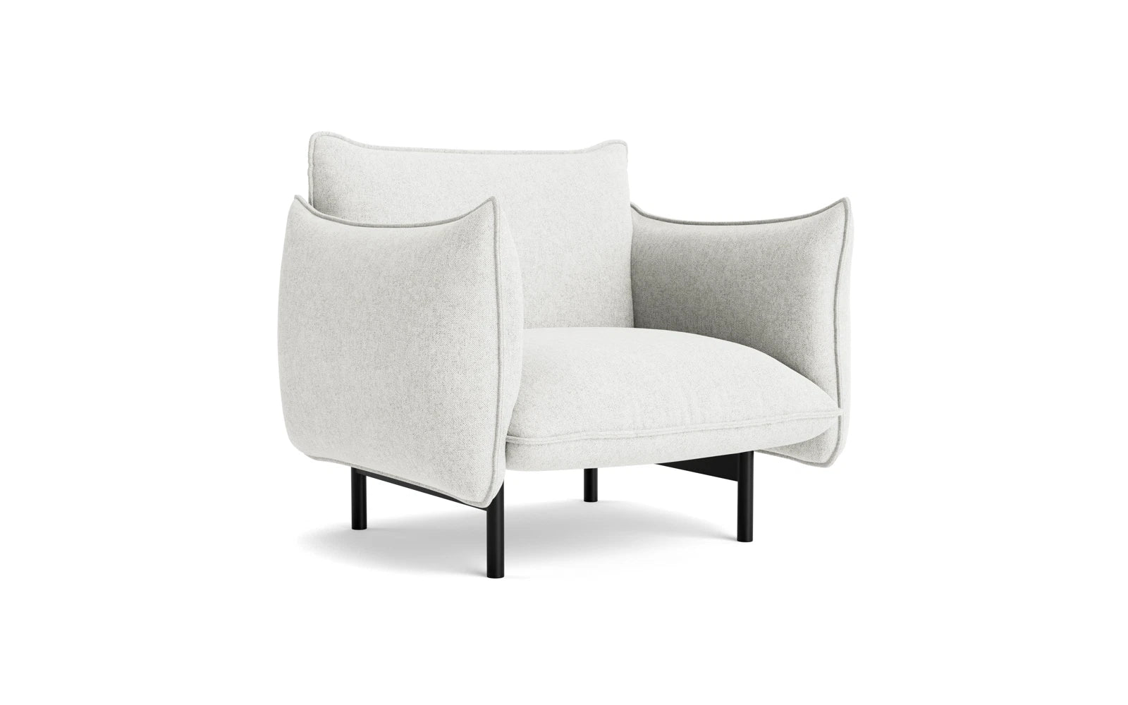 Der Ark Sessel von Normann Copenhagen: Sanfte Rundungen, pralle Kissen, minimalistisch und elegant. Einladender Sitzkomfort mit luftiger Optik.