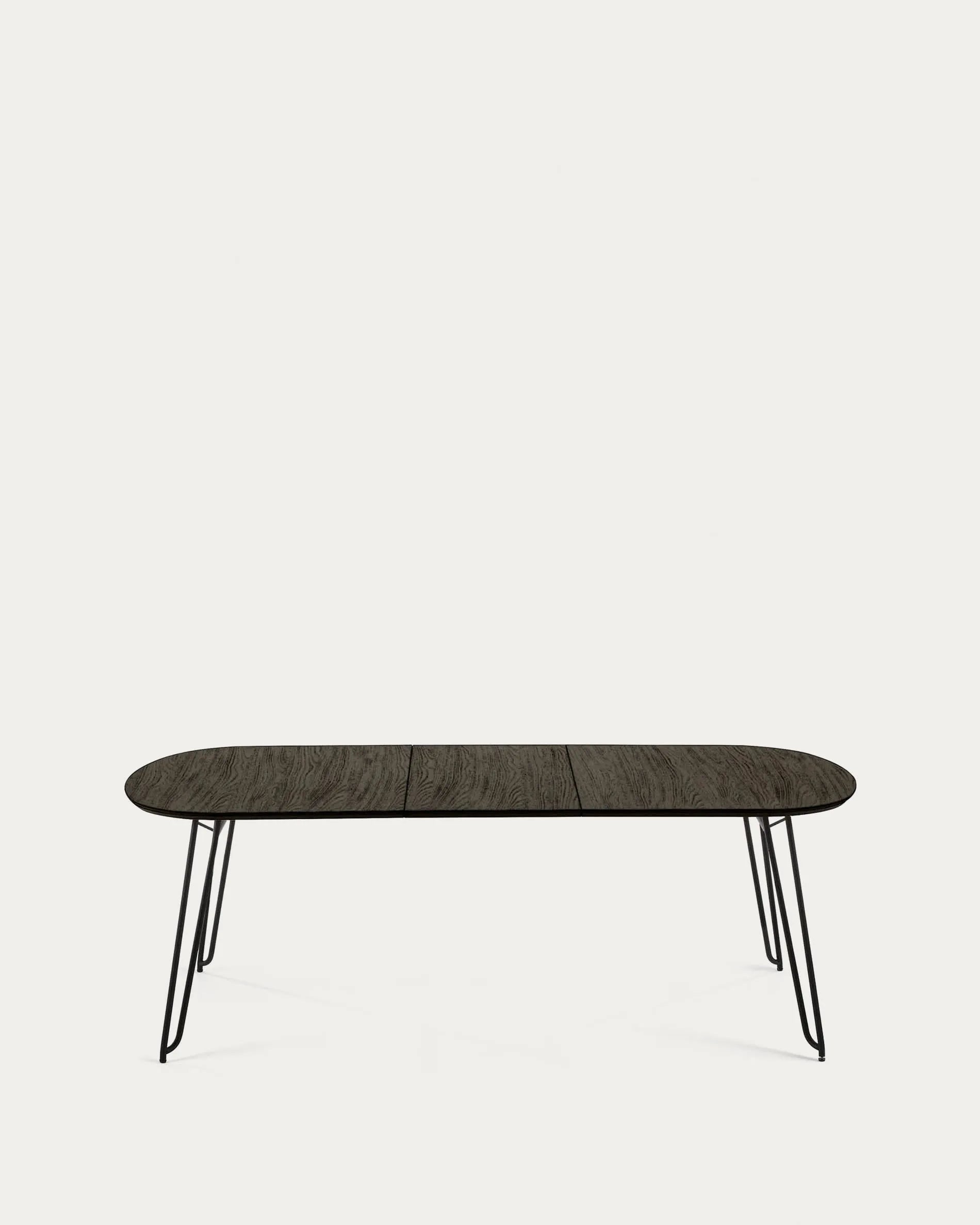 Eleganter Tisch mit Eschenfurnier, ausziehbar von 140 auf 220 cm, schwarze Stahlbeine, ideal für stilvolle Flexibilität.